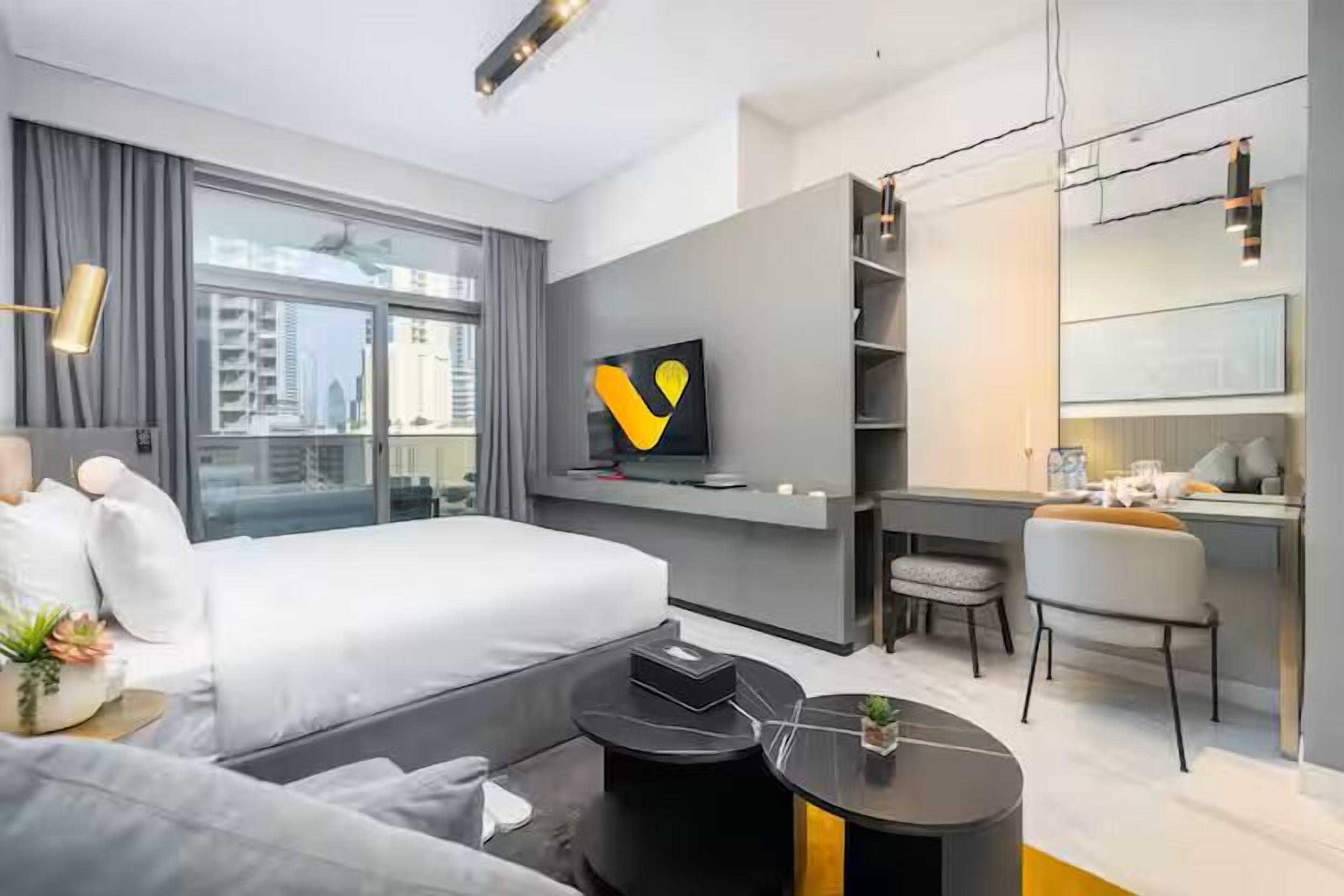 Estúdio superluxo, sacada, vista para a cidade | Sala de estar | Smart TV 65 polegadas com canais a cabo