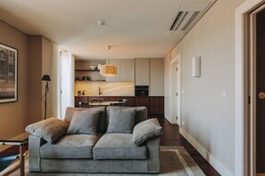 Familienapartment | Wohnbereich | Flachbildfernseher