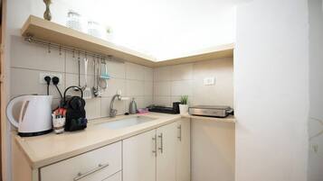 Fridge, microwave, dining tables