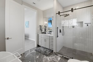 Shower, hair dryer, towels