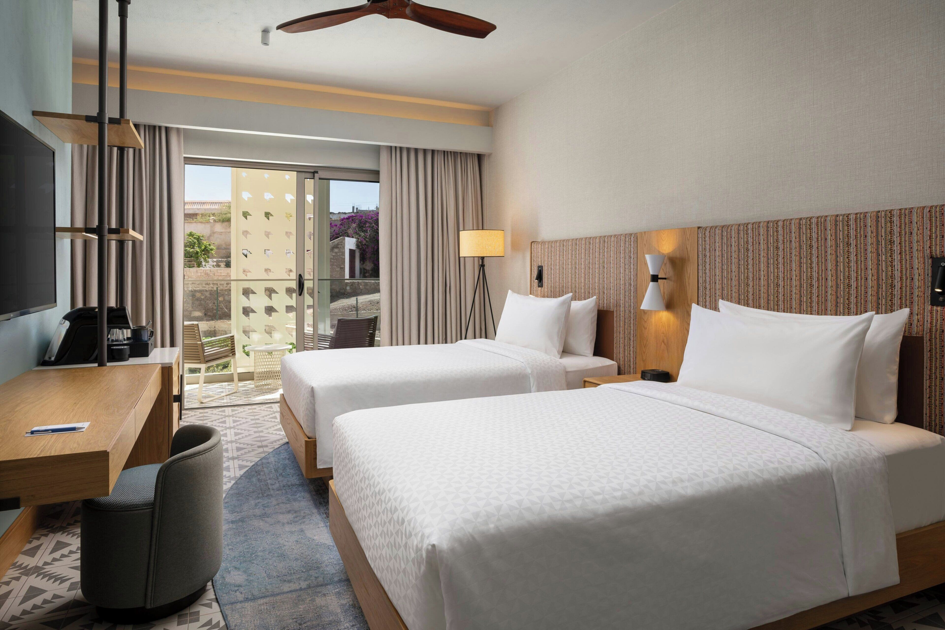 Deluxe Room, 2 Single Beds, Balcony (view) | Minibar, in-room safe, desk, laptop workspace