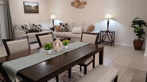 TV - Spacious 3 BR Family Townhome in Gated Community - Pool, Gym, Minutes to Disney! (Kissimmee)