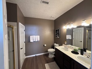 Shower, hair dryer, towels, soap