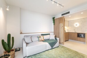 Apartment | Living area - Apartamento Deluxe Novo  (Santos)