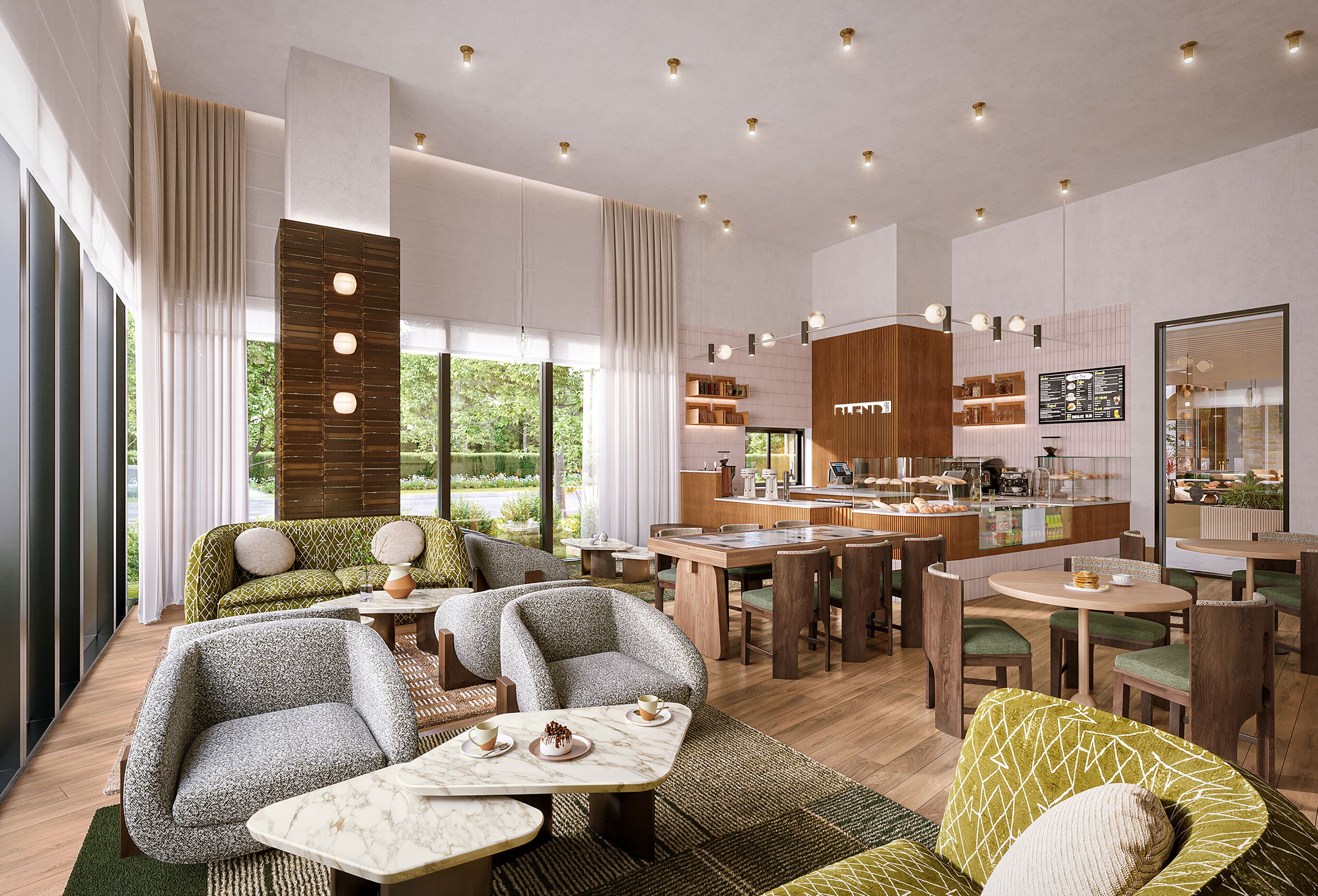 A modern hotel lobby with seating areas, a dining space, and a kitchen visible in the background.