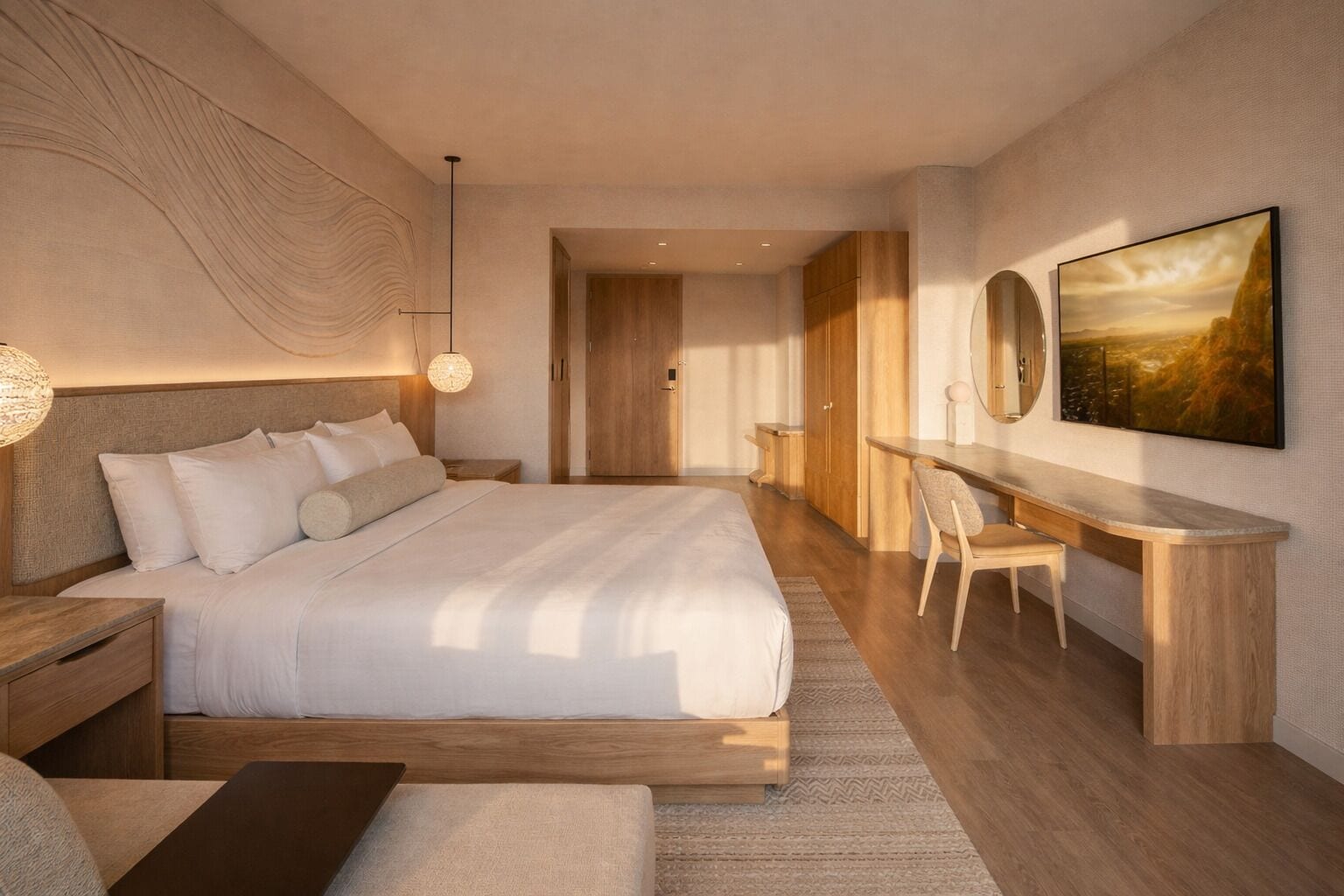 A modern bedroom with a large bed, a desk, and a chair, a large painting on the wall, and a unique textured wall design.