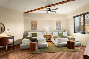 A modern bedroom with two beds, a desk, and a large window. - 5.5k Sqft Luxury Home with Large Suites, Views, Hot Tub & Firepit (Sedona)