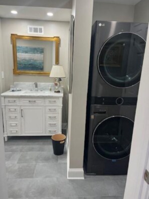 Hair dryer, towels, soap, toilet paper - FIFA World Cup 1-Bedroom Apartment in Buckhead, Atlanta, Georgia (Atlanta)