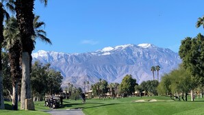 A golf course with a clear path leading to a mountain range in the background. - Coachella @ Marriott’s Palm Desert Villas II, One bedroom/Kitchen on golf course (Palm Desert)