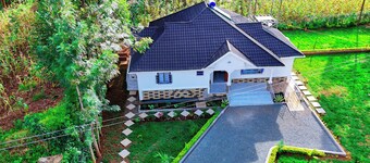 Asumbi Vacation Home - Luxury and Privacy in the village.