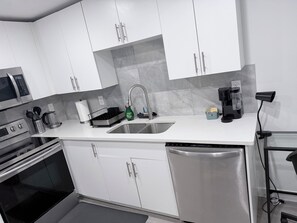 Microwave, oven, stovetop, dishwasher - Cozy 1 bedroom Basement with Separate bedroom and patio (Edmonton)
