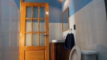 Shower, towels, soap, shampoo