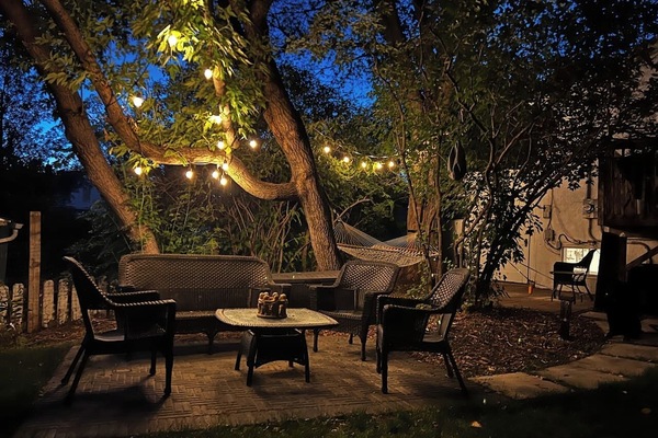 Cozy nights under the lights. The perfect spot for evening drinks and conversation.