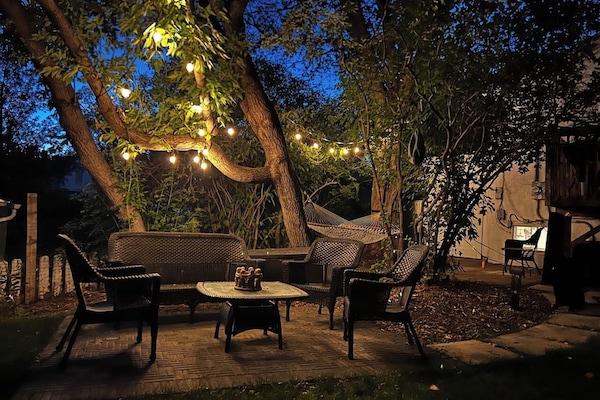 Cozy nights under the lights. The perfect spot for evening drinks and conversation.