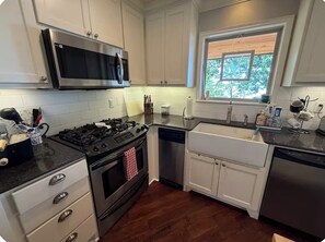 Fridge, microwave, oven, stovetop - Charming 6-bedroom house in serene Grove , OK perfect for families (Grove)