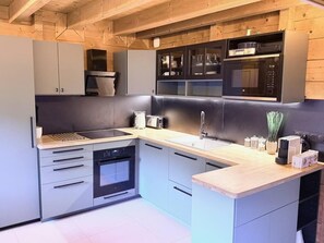 Fridge, microwave, oven, stovetop - Eden Criou - Chalet sleeps 7 to 9 - pool/sauna (Morillon)