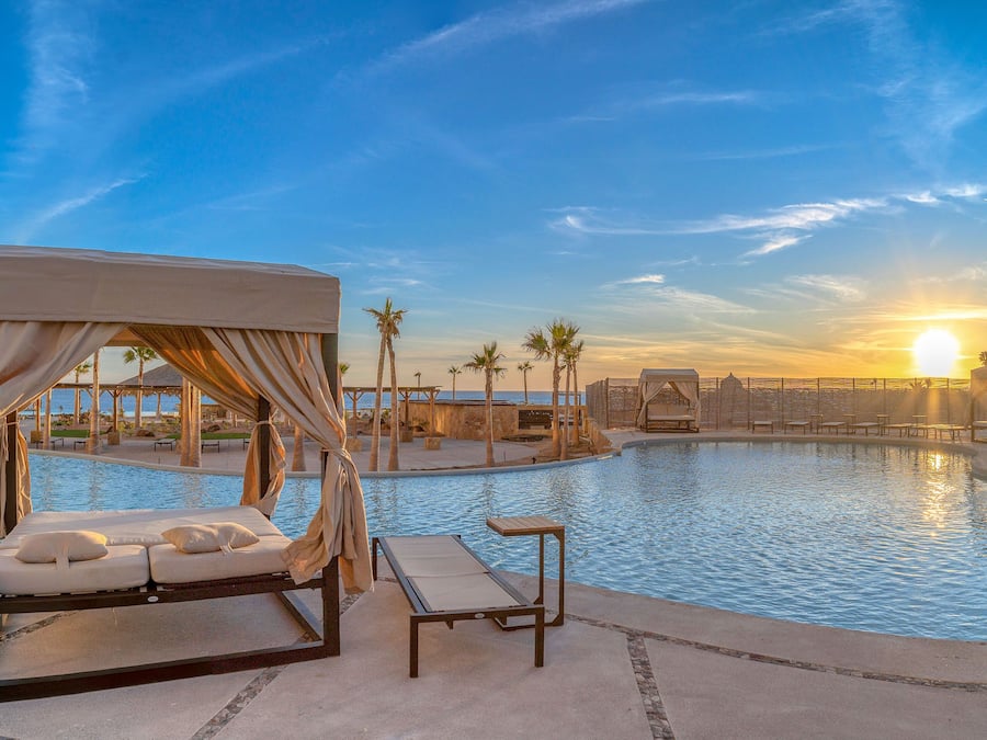 6 outdoor pools, open 8:00 AM to midnight, free cabanas, pool umbrellas