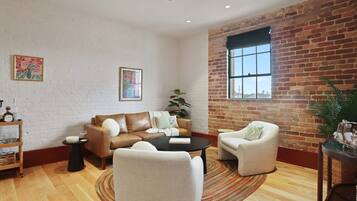 Luxury Apartment, 4 Bedrooms, Air conditioning | Living area | 48-inch Smart TV with digital channels, Netflix, streaming services