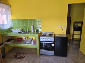Deluxe Double or Twin Room, Multiple Beds, Patio, Garden View | Private kitchen