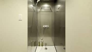 Combined shower/tub, free toiletries, hair dryer, slippers