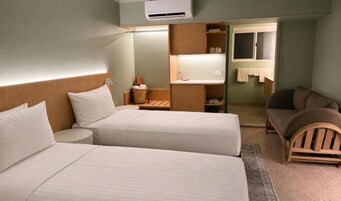 Deluxe King Split Room | Premium bedding, iron/ironing board, free WiFi, bed sheets