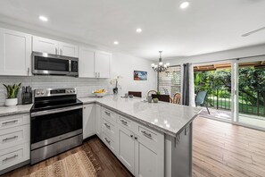 Fridge, microwave, oven, stovetop - Enjoy stunning partial ocean views in this 2BR Lahaina condo at Maui Sands. (Lahaina)