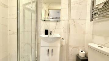 Hair dryer, towels, soap, toilet paper