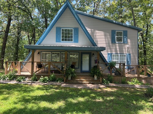 One Mile Lake House is a cozy 2 story, 2 bedroom, 2 bath, A- frame home.