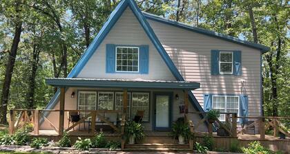 One Mile Lake House is a cozy 2 story, 2 bedroom, 2 bath, A- frame home.