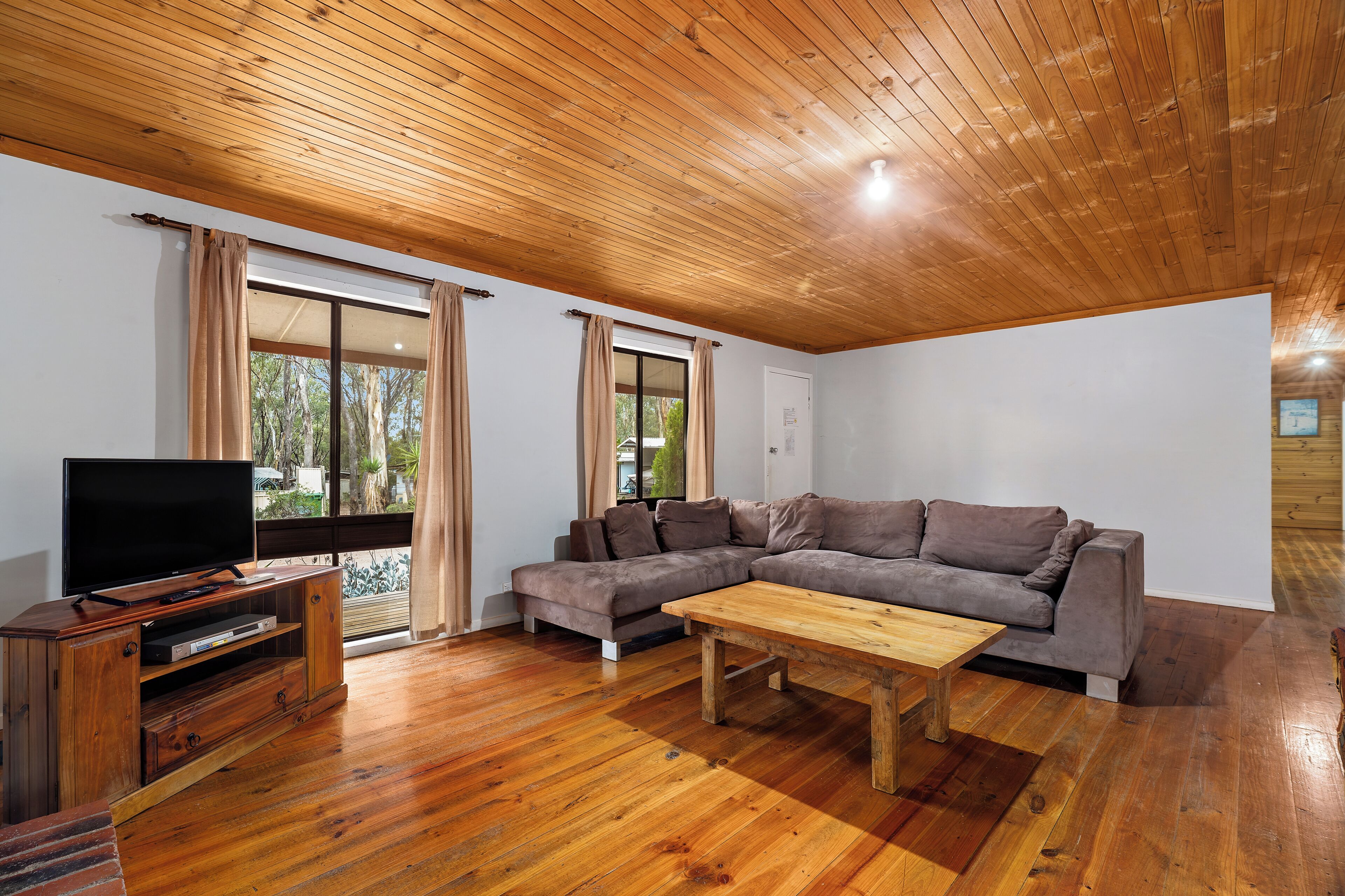 Casa, patio, vistas al lago (4 Bedroom Laanecoorie Lodge) | Zona de estar