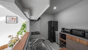 Apartment | Private kitchen | Fridge, microwave, stovetop, rice cooker