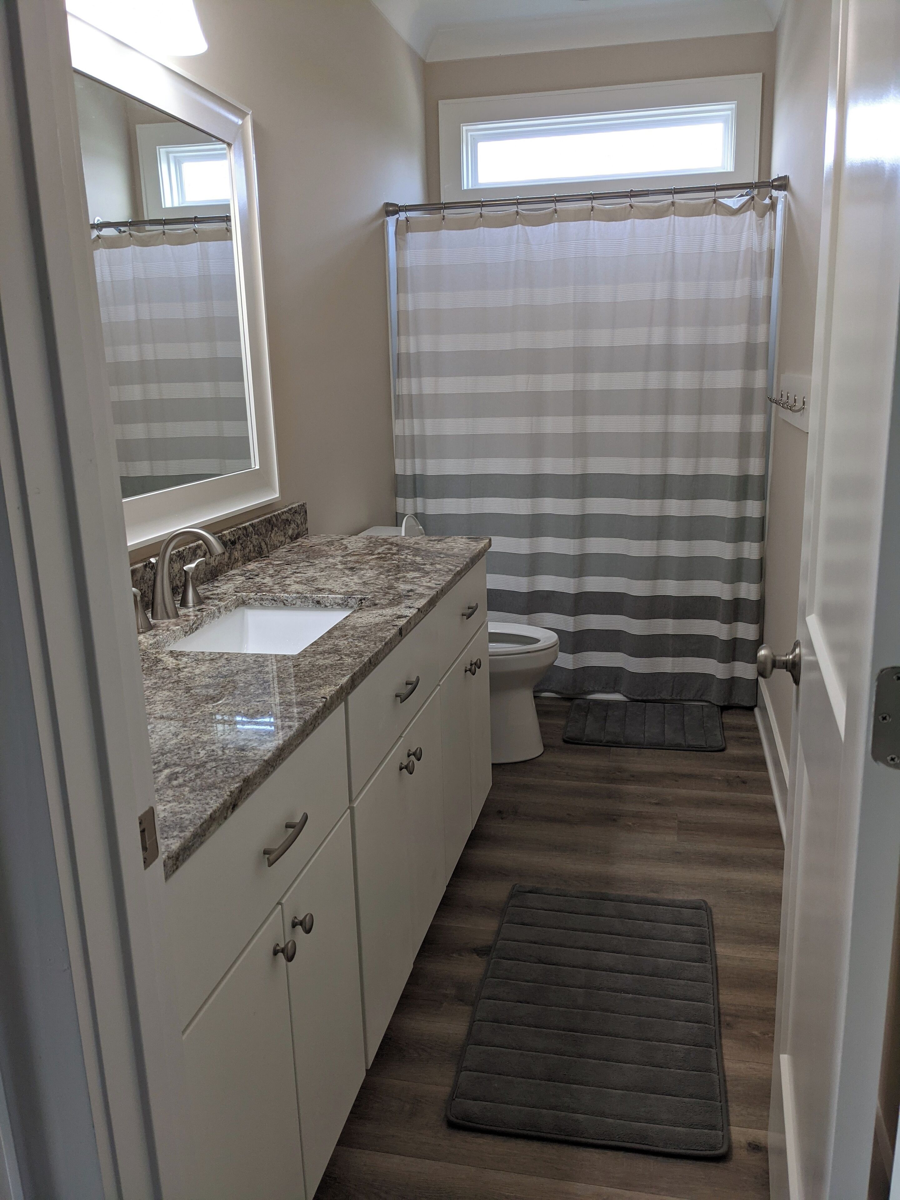 Hair dryer, towels, soap, toilet paper
