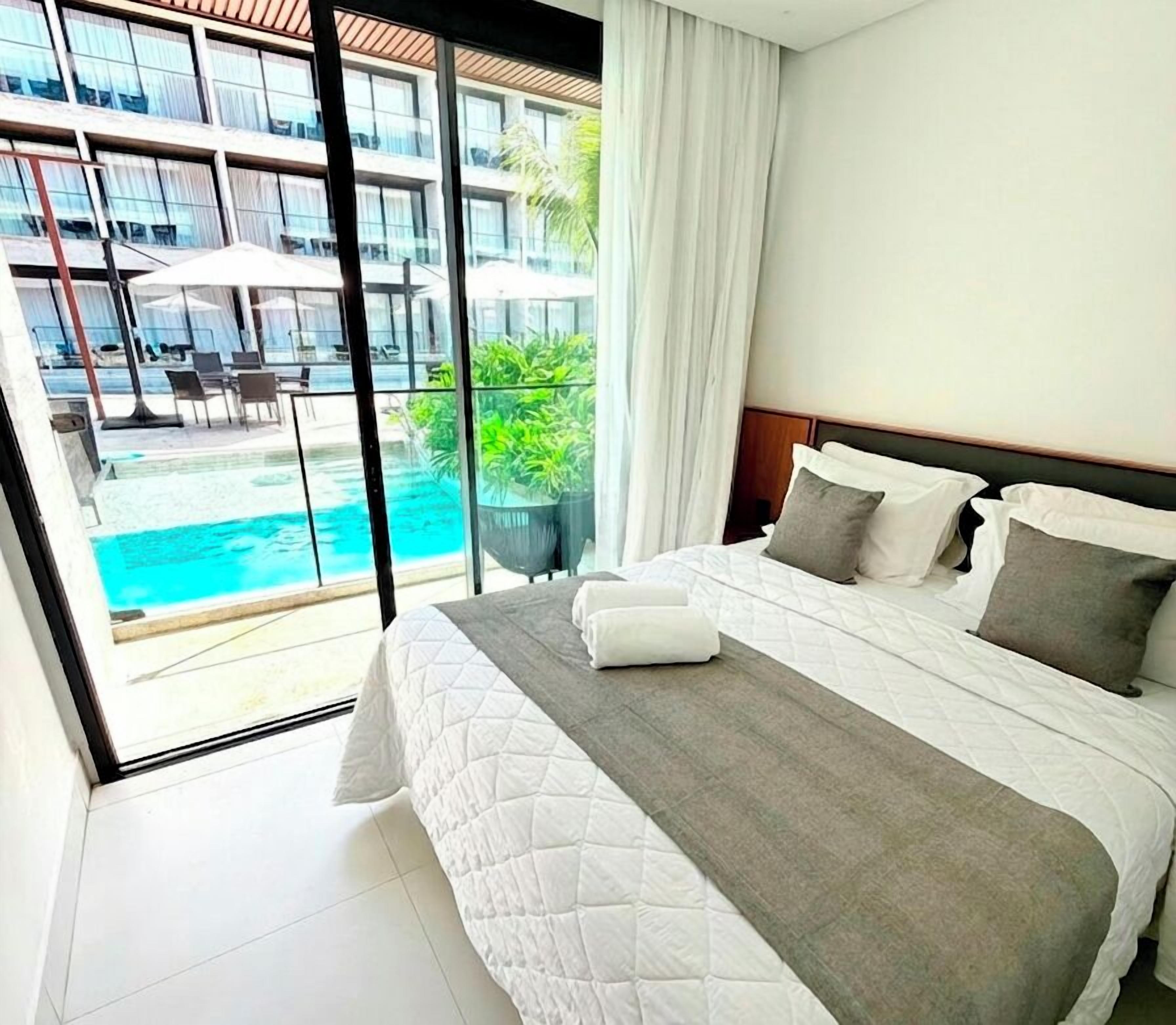 Premium Apartment, 1 Bedroom, Pool Access | Premium bedding, individually decorated, individually furnished