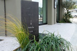A hotel sign with 'nebi' and 'HOTEL' text, indicating the hotel's name. - Arima Hot Spring nebi (Kobe)