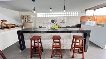 Fridge, microwave, stovetop, cookware/dishes/utensils