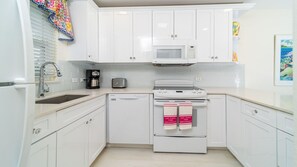 Microwave, oven, stovetop, dishwasher - 2 Bedroom, 2 Bathroom Ground Floor Condo on Seven Mile Beach (Seven Mile Beach)
