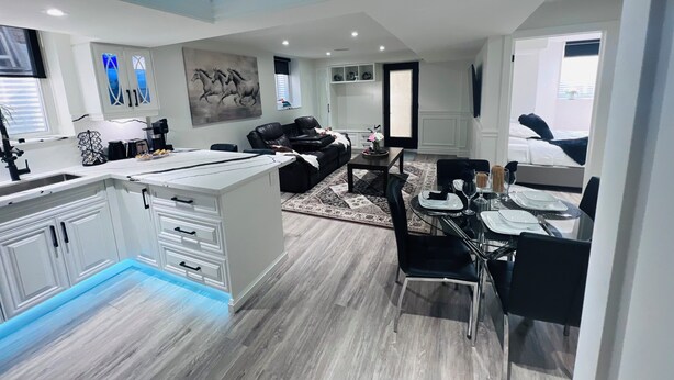 A modern apartment with a kitchen, dining area, living room, and bedroom. - Luxury 2BR/2BA Modern B Apartment in Ajax, Toronto (Ajax)
