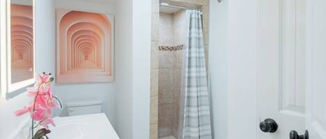 Eco-friendly toiletries, hair dryer, towels, soap