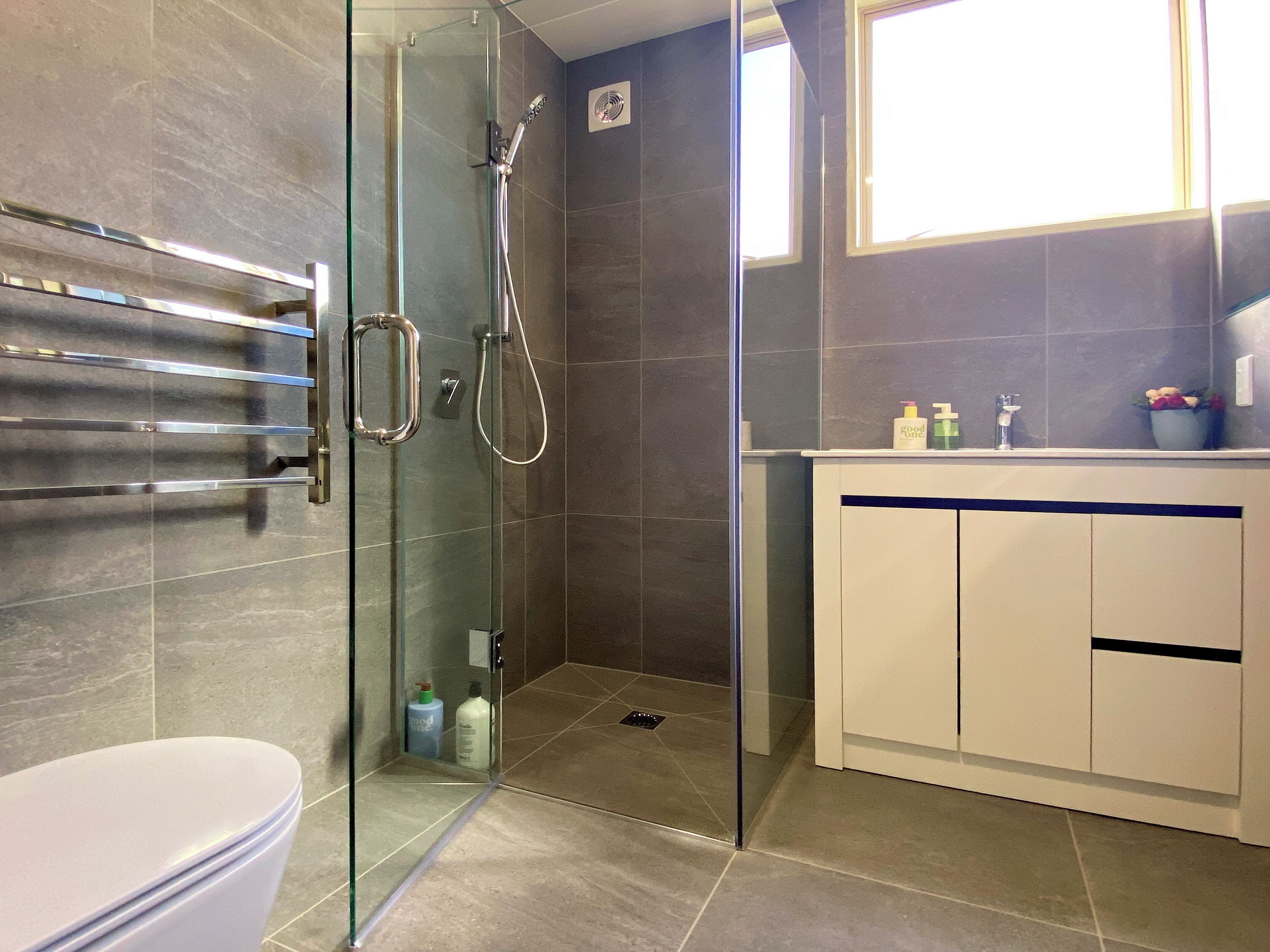 Shower, hair dryer, towels, soap