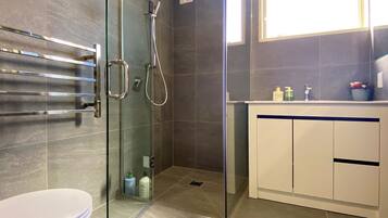 Shower, hair dryer, towels, soap