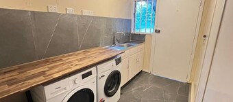 Renovated 5 BR Home with 4 A/C and Free Parking