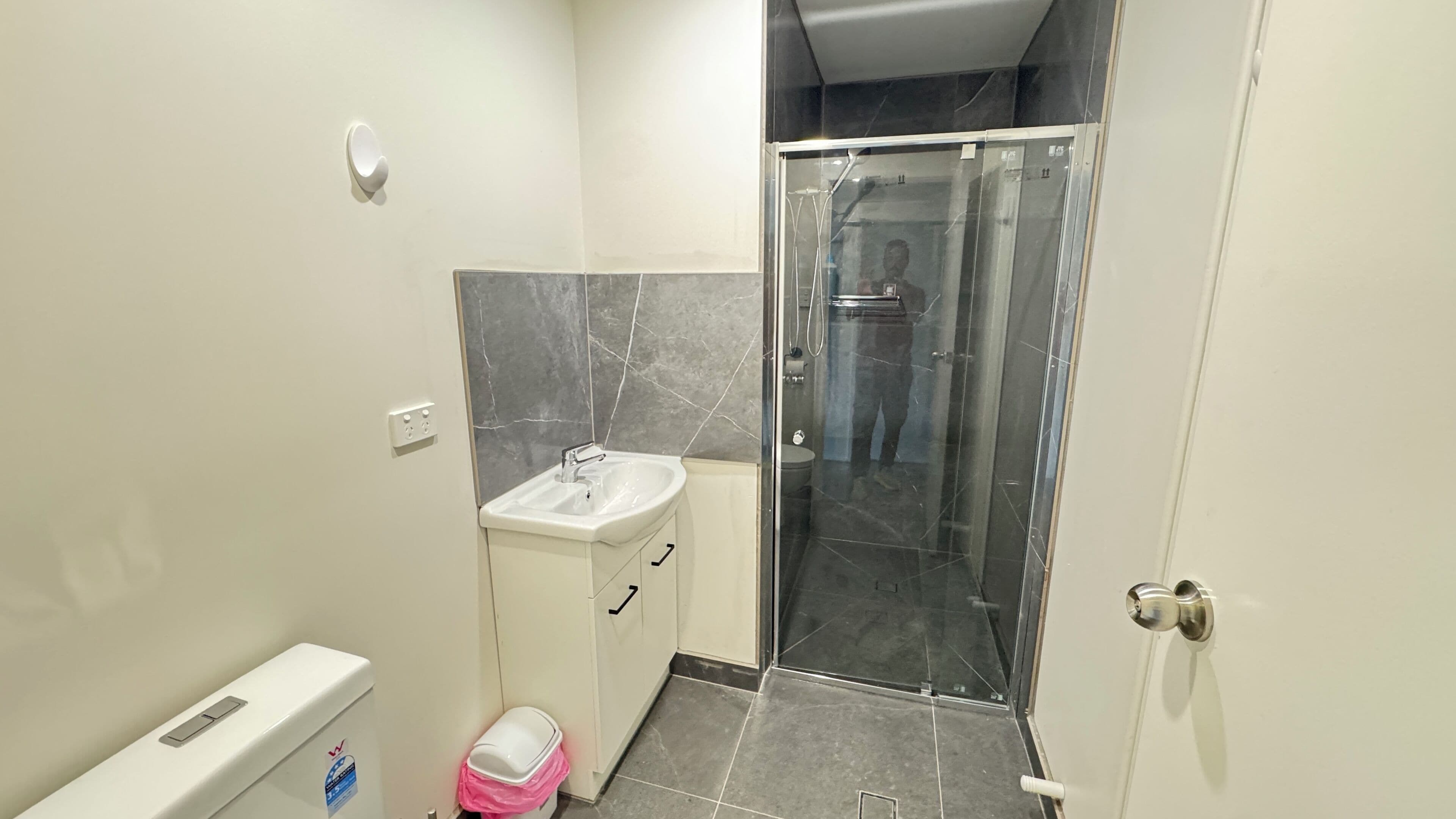 Shower, towels, soap, toilet paper