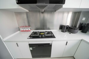 Fridge, microwave, stovetop, cookware/dishes/utensils - Tyms 3BR 2BA Apt near Xujiahui Metro  (Shanghai)