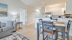 A modern apartment with a dining area, kitchen, and living room. - Golfer’s Paradise w/ Pool! 6 Mi to Myrtle Beach (Myrtle Beach)