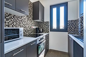 Apartment, City View | Private kitchen | Full-sized fridge, microwave, oven, stovetop - Maryam's 2-BR Apt. With Pool & Balcony in Larnaca (Larnaca)