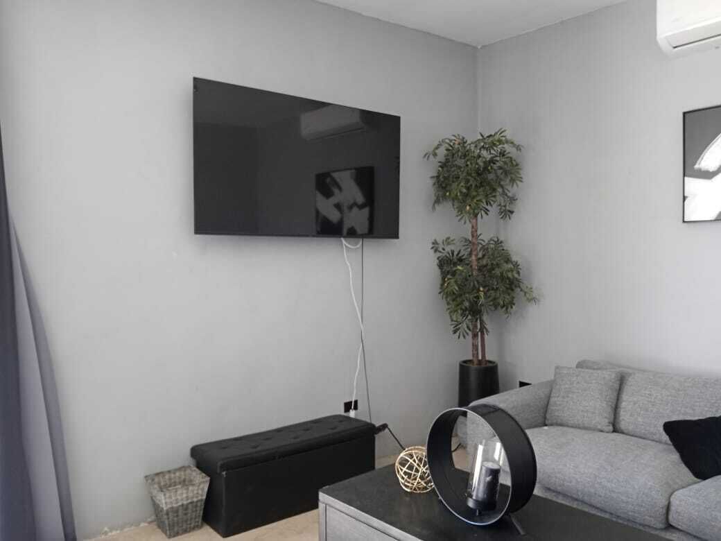 Studio Suite tiện nghi đơn giản, ban công, quang cảnh vườn | Khu phòng khách