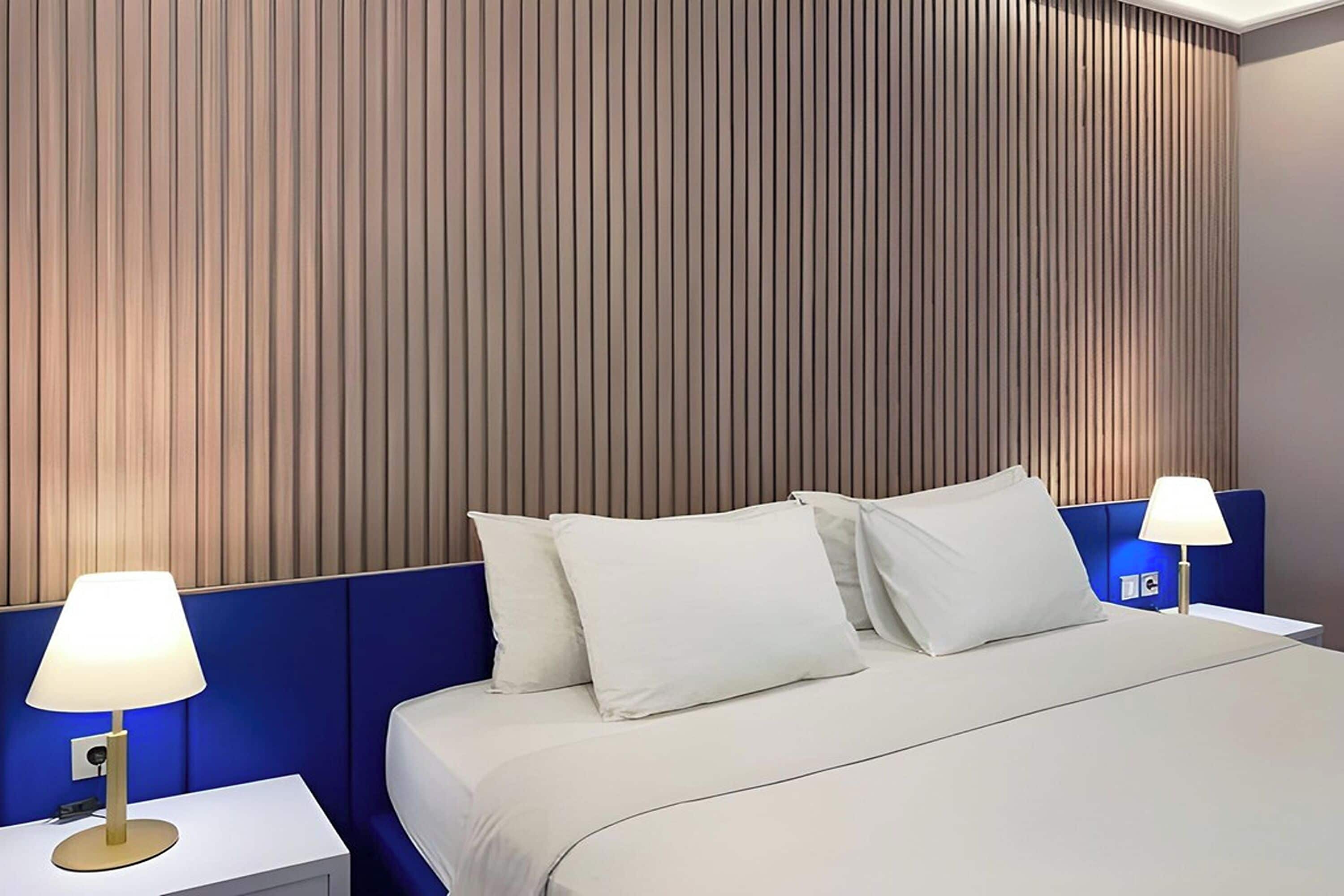 Executive Room | Blackout drapes, iron/ironing board, free WiFi, bed sheets