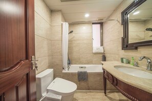 A bathroom with a toilet, shower, and sink. - Tyms Gubei Apt 2BR Residence near Gubei (Shanghai)