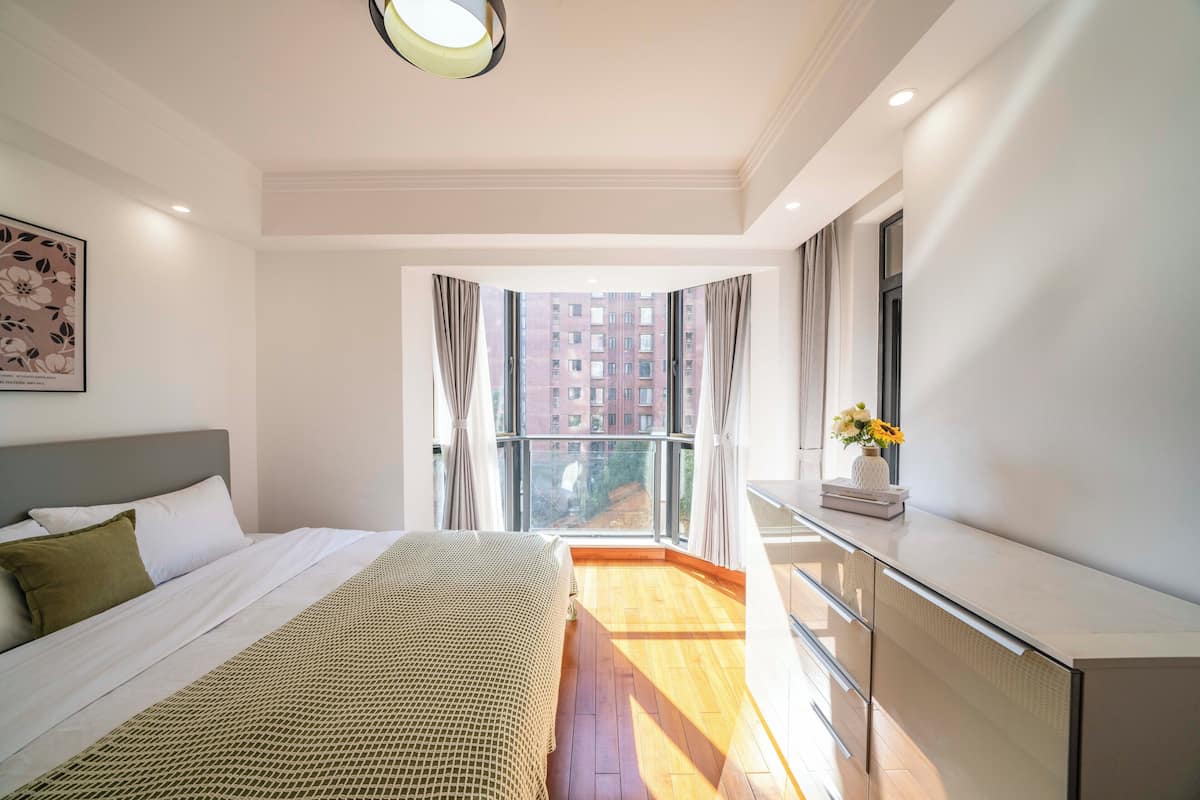 Superior Quadruple Room, Multiple Beds, Balcony, City View | Desk, laptop workspace, blackout drapes, soundproofing