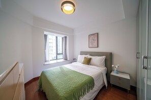 Desk, laptop workspace, blackout curtains, soundproofing - Tyms Gubei Apt 2BR Residence near Gubei (Shanghai)
